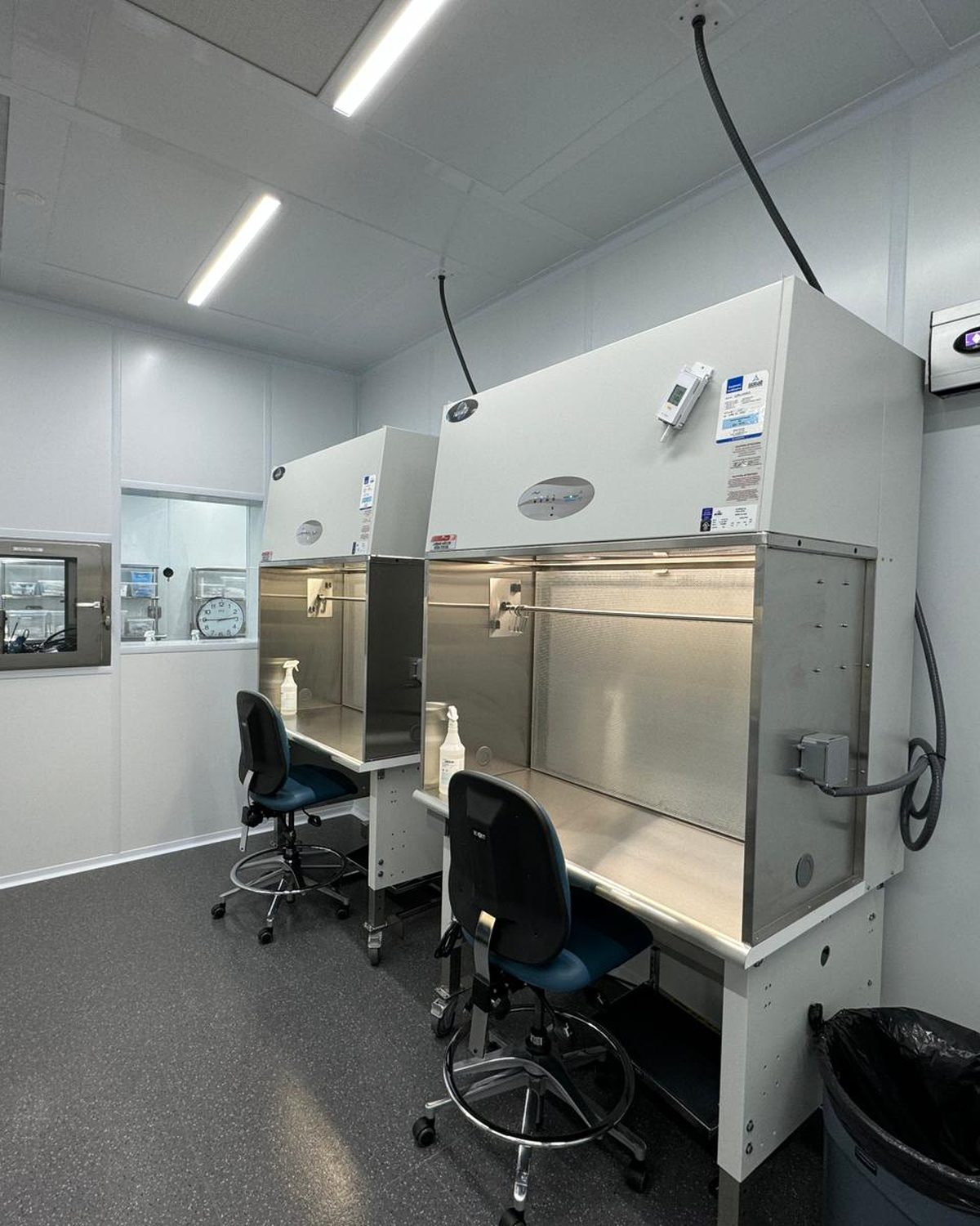 Two compounding aseptic isolators installed in a sterile compounding suite